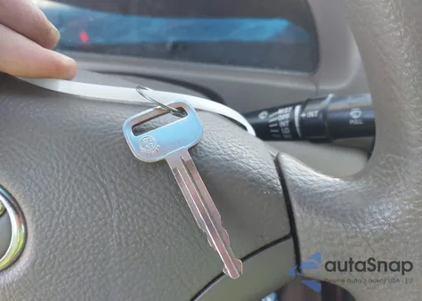 2005 Toyota Camry Le z USA, uszkodzony, nr VIN 4T1BE32K65U429973